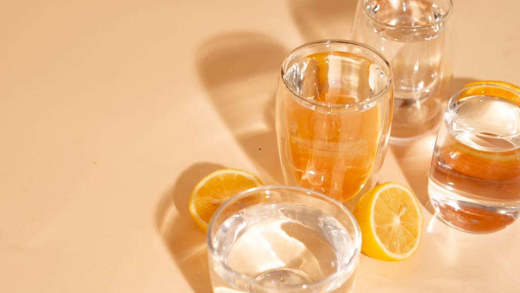 Glasses of water and a lemon