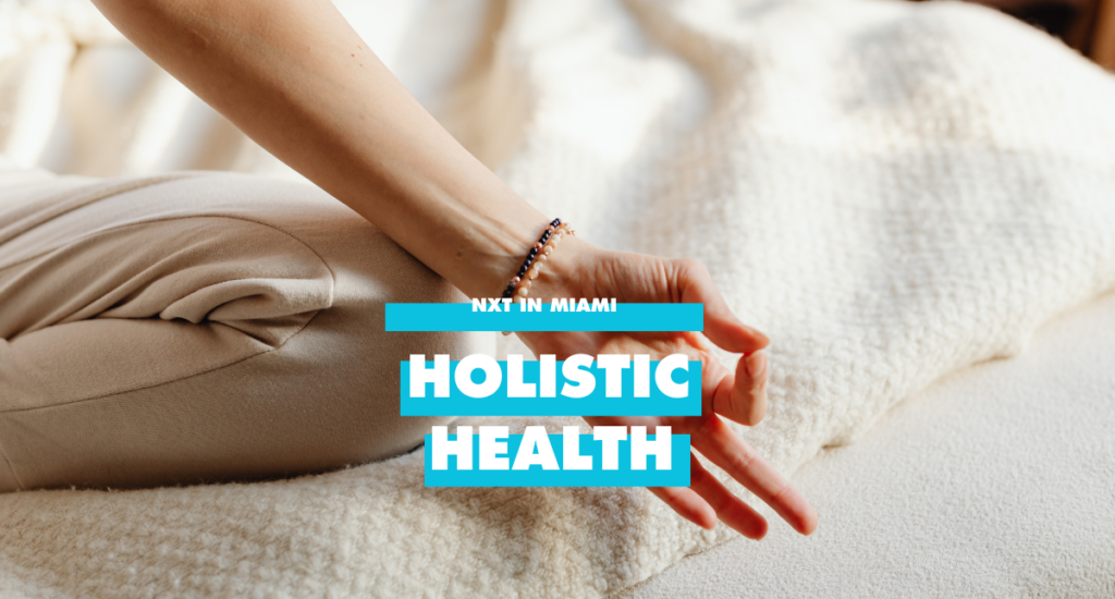 white arm making a mudra between thumb and forefinger.